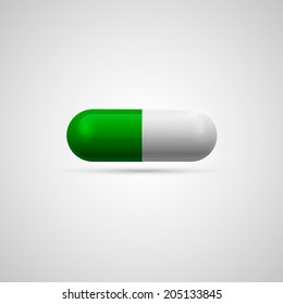 Medicine capsule pill in two glossy half green and white. Vector illustration