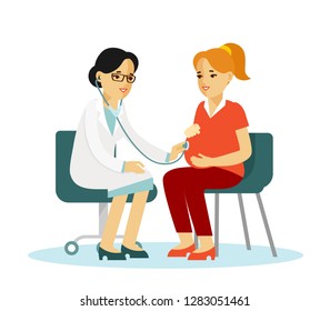 Medicine concept with practitioner doctor woman and young pregnant girl patient in hospital medical office. Doctor doing medical examination of pregnant with stethoscope. Consultation and diagnosis.