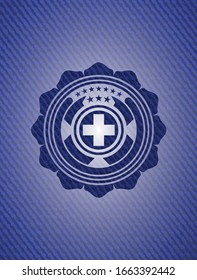 medicine icon inside badge with jean texture