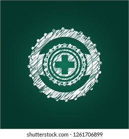 medicine icon inside chalkboard emblem written on a blackboard