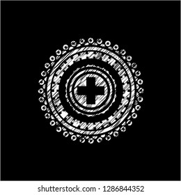 medicine icon inside chalkboard emblem written on a blackboard