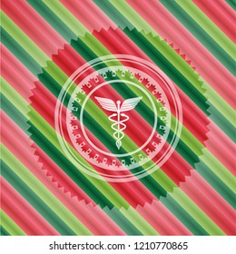 medicine icon inside christmas emblem.