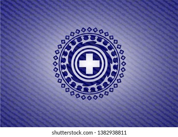 medicine icon inside denim background
