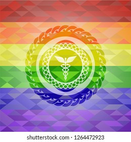 medicine icon inside emblem on mosaic background with the colors of the LGBT flag