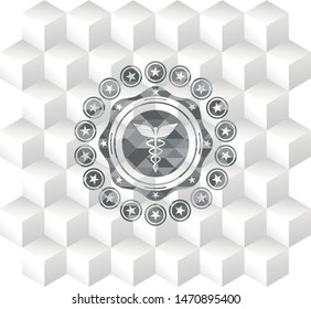 medicine icon inside grey emblem with geometric cube white background