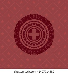 medicine icon inside red emblem