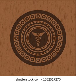 medicine icon inside vintage wood emblem