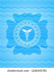 medicine icon inside water wave badge.