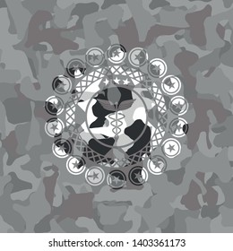 medicine icon on grey camo pattern