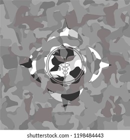 medicine icon on grey camouflage pattern