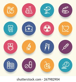 Medicine icons with color buttons on gray background.