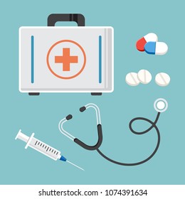 Medicine set. First aid kit, stethoscope, syringe, and pills. Vector illustration