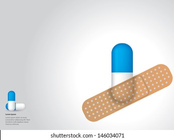 Medicine sticked to gray background with plaster