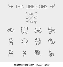 Medicine thin line icon set for web and mobile. Set includes- tooth, eye, ear, hands, bone, brain, human icons. Modern minimalistic flat design. Vector dark grey icon on light grey background.