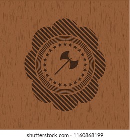 medieval axe icon inside badge with wood background