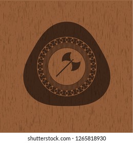 medieval axe icon inside badge with wooden background
