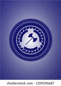 medieval axe icon inside badge with denim texture