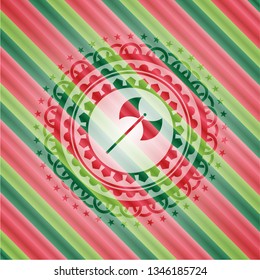 medieval axe icon inside christmas emblem.