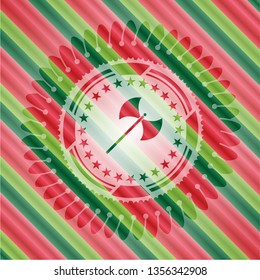 medieval axe icon inside christmas colors emblem.