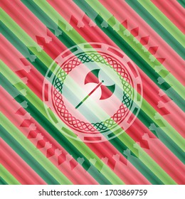 medieval axe icon inside christmas colors style badge. 