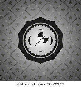medieval axe icon inside dark emblem. 