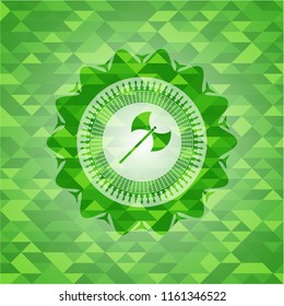 medieval axe icon inside green emblem. Mosaic background