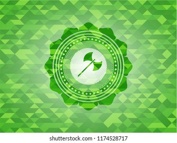 medieval axe icon inside green emblem. Mosaic background