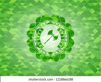 medieval axe icon inside green emblem with triangle mosaic background