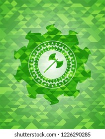 medieval axe icon inside green emblem. Mosaic background