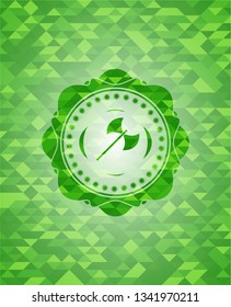 medieval axe icon inside green emblem with mosaic ecological style background