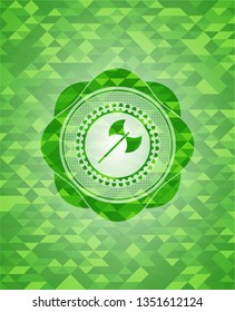 medieval axe icon inside green mosaic emblem