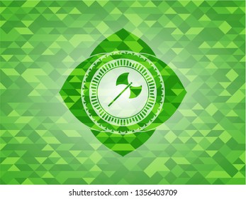 medieval axe icon inside green emblem with mosaic background
