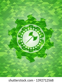 medieval axe icon inside green emblem with triangle mosaic background