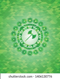 medieval axe icon inside green mosaic emblem