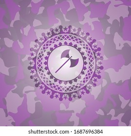 medieval axe icon inside pink camouflaged emblem
