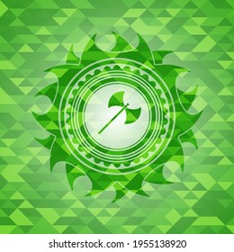 medieval axe icon inside realistic green emblem. Mosaic background. 
