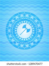 medieval axe icon inside sky blue water wave emblem.