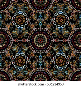 Medieval floral royal pattern. Decorative symmetry arabesque. Yellow seamless pattern on a black background. Good for greeting card for birthday, invitation or banner. Vector illustration.