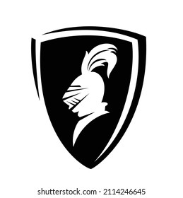 medieval knight wearing helmet profile head in heraldic shield - legend hero guard coat of arms black and white vector design