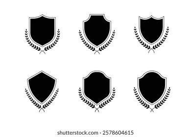 Medieval shields with laurel wreaths set. Trophy, awards, vintage insignia shields collection. Black color. Premium quality. Vector illustration isolated on white background.	