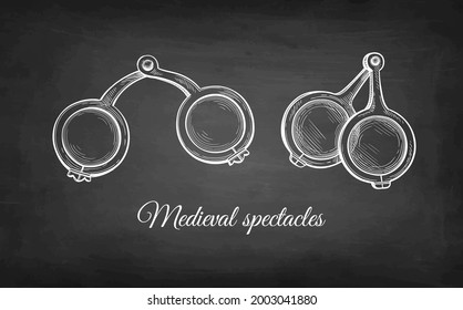 Medieval spectacles. Chalk sketch set of ancient eyeglasses on blackboard background. Hand drawn vector illustration. Vintage style stroke drawing.