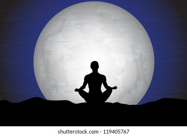 meditating man on the background of the moon