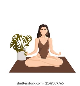 meditating woman plant yoga mat relax