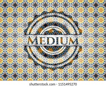 Medium arabic badge. Arabesque decoration.