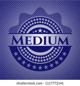 Medium badge with denim background