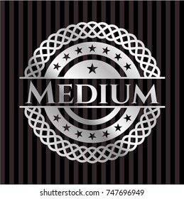 Medium silvery badge