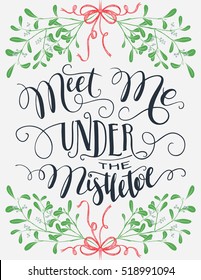 Meet me under the mistletoe. Brush calligraphy isolated on background. Christmas and save the date typography poster