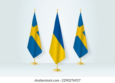 Meeting concept between Ukraine and Sweden. Flags on a flag stand.