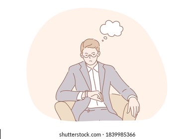 Meeting, delay, business concept. Impatiend displeased businessman leader ceo manager boss waits for job interview negotiation partner looks at watches checking time. Waiting for delayed employee.