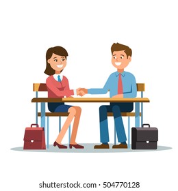 The meeting of two businessmen and businesswoman business handshake. A young man and woman in a business suit holds out his hand in greeting to the partner sitting at the office desk .